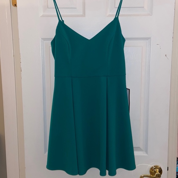 Size 13/14 dress in sea green (teal) color. Can be used for homecoming - Picture 1 of 5